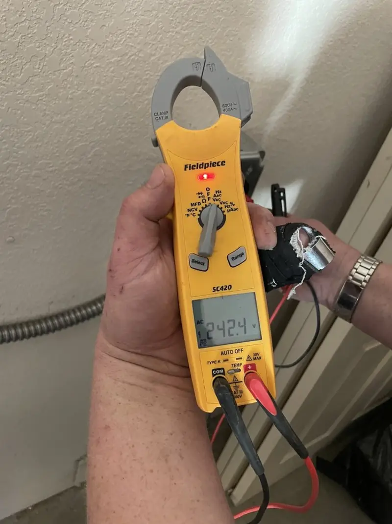 Voltage testing with clamp meter during Hot Tub / Pool Electrical Wiring in Waverly